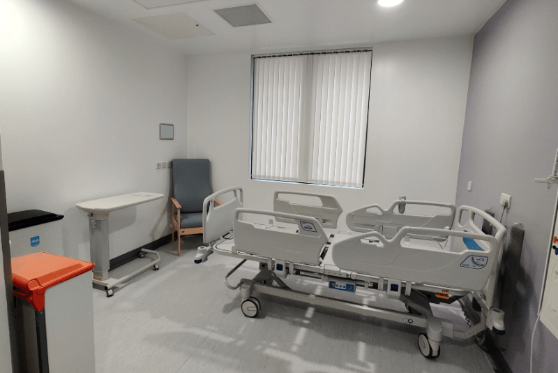 Image of hospital room with protective flooring in.