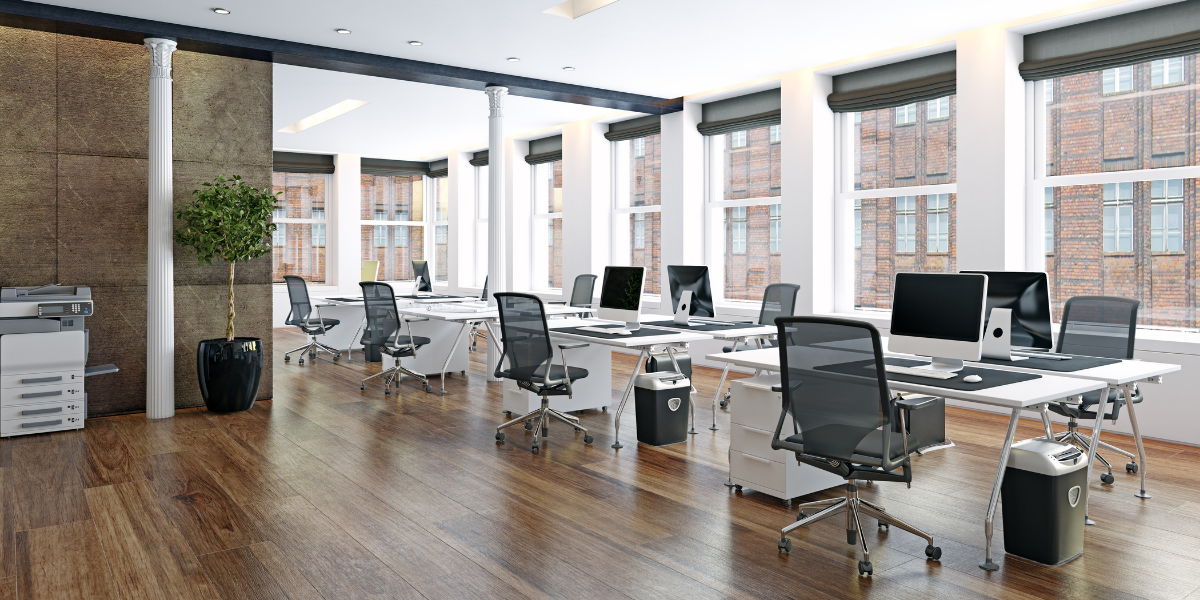 An office with wood flooring